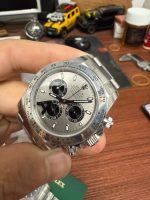 Angled view of VS Factory Rolex Daytona 126509 dial and metal tachymetric bezel
