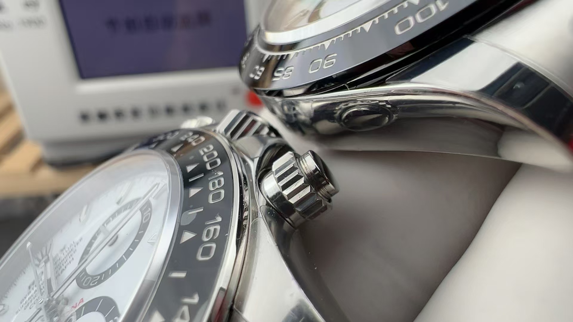 VSF Daytona 126500LN crown guard and polished bezel rim beside the older 116500LN profile