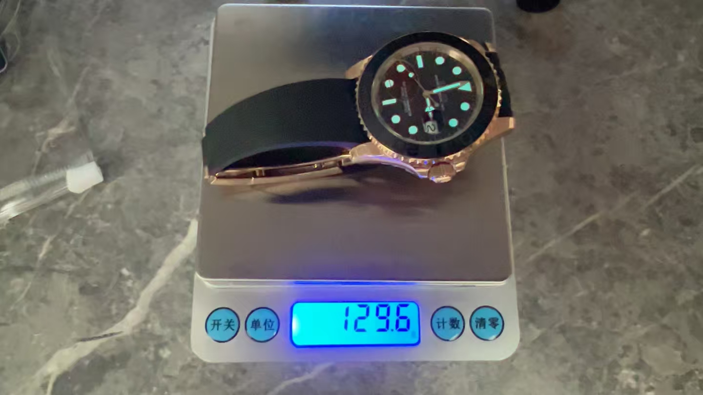 VSF Yacht-Master 40 Ref. 126655 digital scale measurement showing 129.6 grams